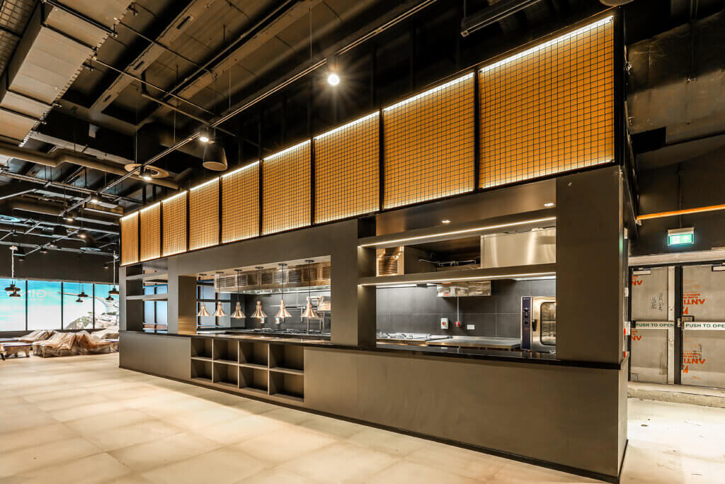 Liverpool Echo restaurant. Wooden Self services stand with multiple variations of dark hard wood